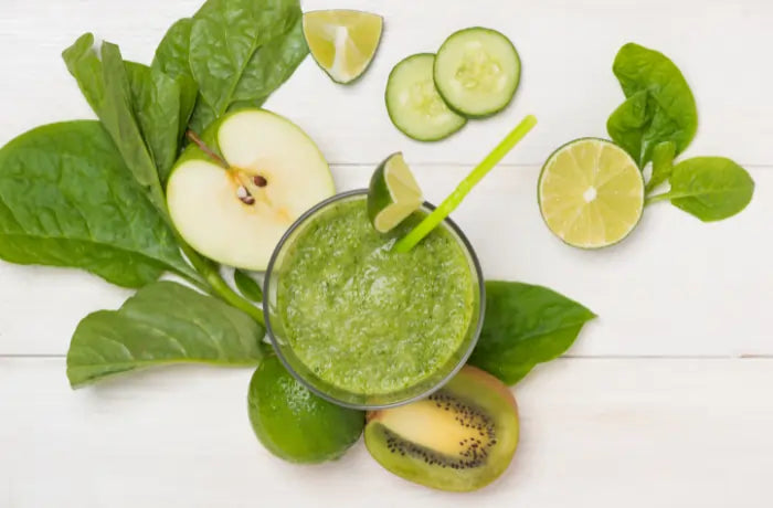 Athlete gut cleanse smoothie made with green vegetables and fruits to support digestion, energy, and gut health for performance